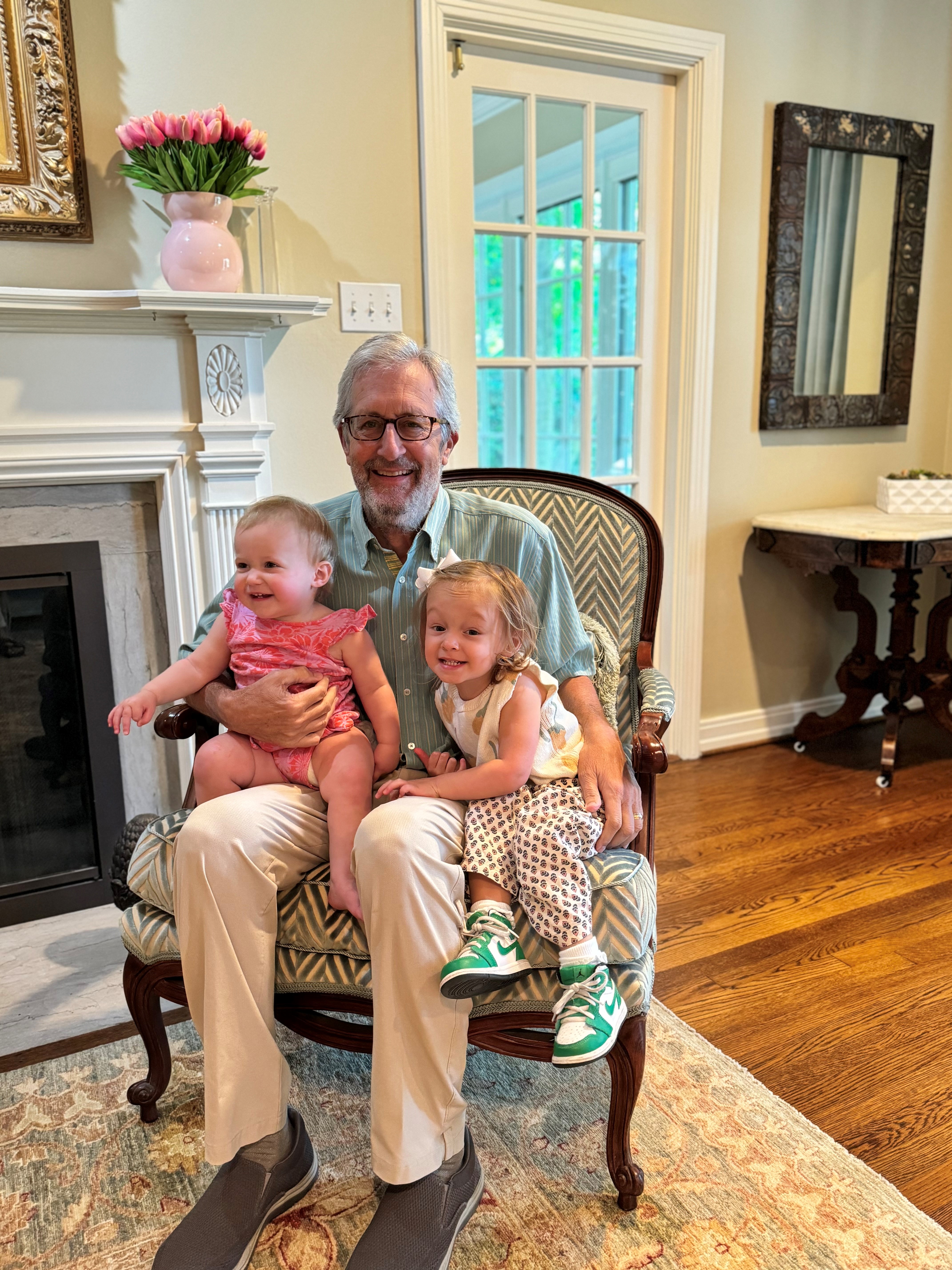 Chuck holds two of his grandchildren