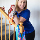 Laura poses with her medals